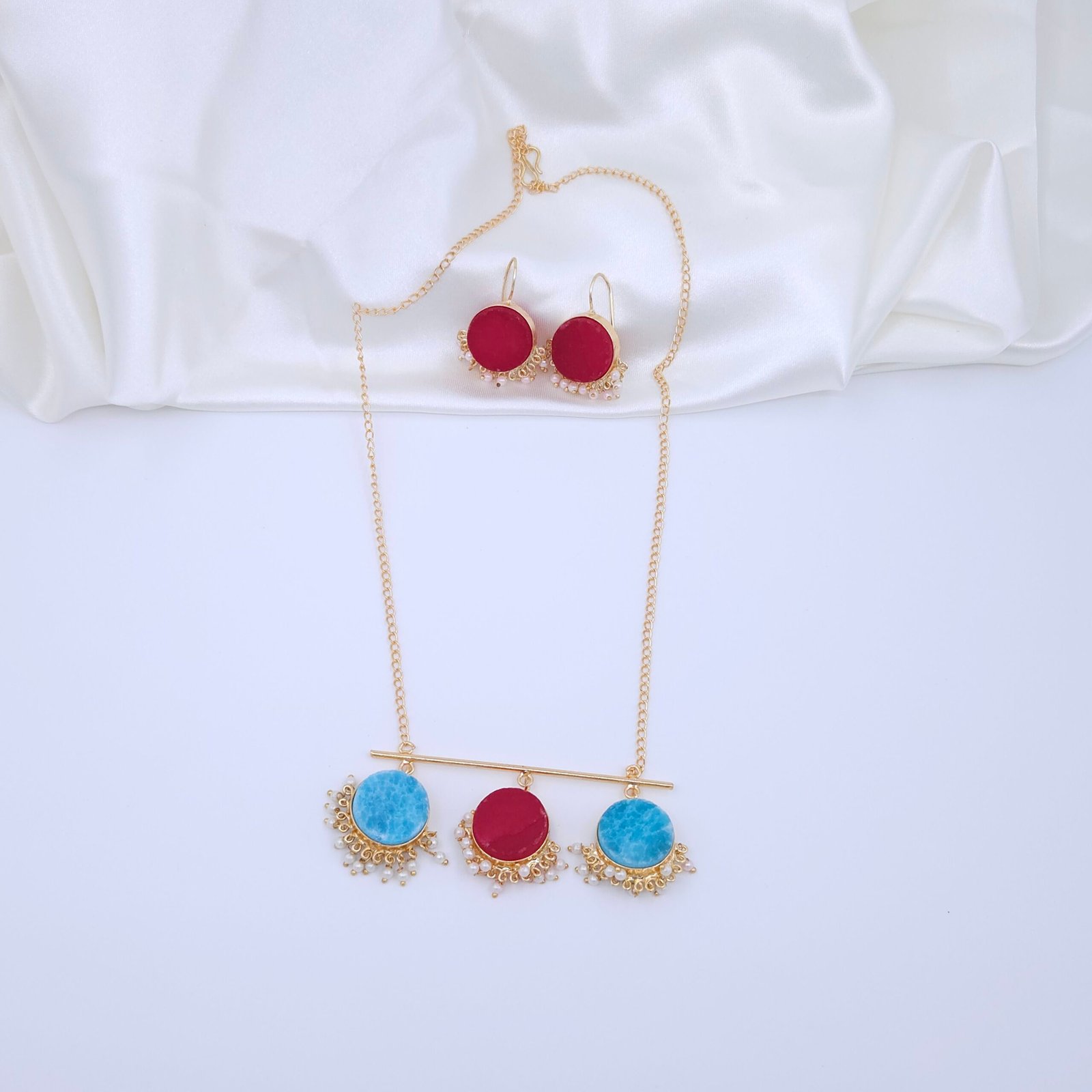 Handcrafted Anti-Tarnish Red & Blue Natural Stone Pearl Jewellery Set – Gold-Plated Necklace & Drop Earrings Handcrafted Anti-Tarnish Red & Blue Natural Stone Pearl Jewellery Set – Gold-Plated Necklace & Drop Earrings