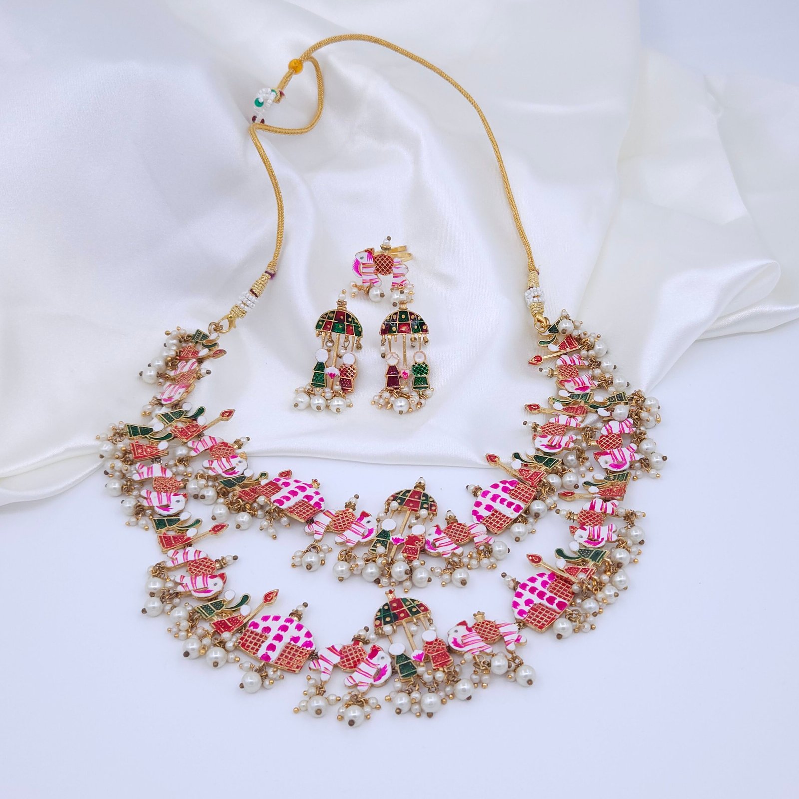 Rajasthani Brass Meenakari Necklace Set with Elephant & Umbrella Motifs Rajasthani Brass Meenakari Necklace Set with Elephant & Umbrella Motifs