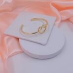 Infinity Knot Adjustable Stainless Steel Cuff Bracelet – Gold Finish