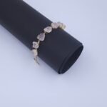 Brass Bracelet with Natural Rose Quartz Stones in Crown Setting