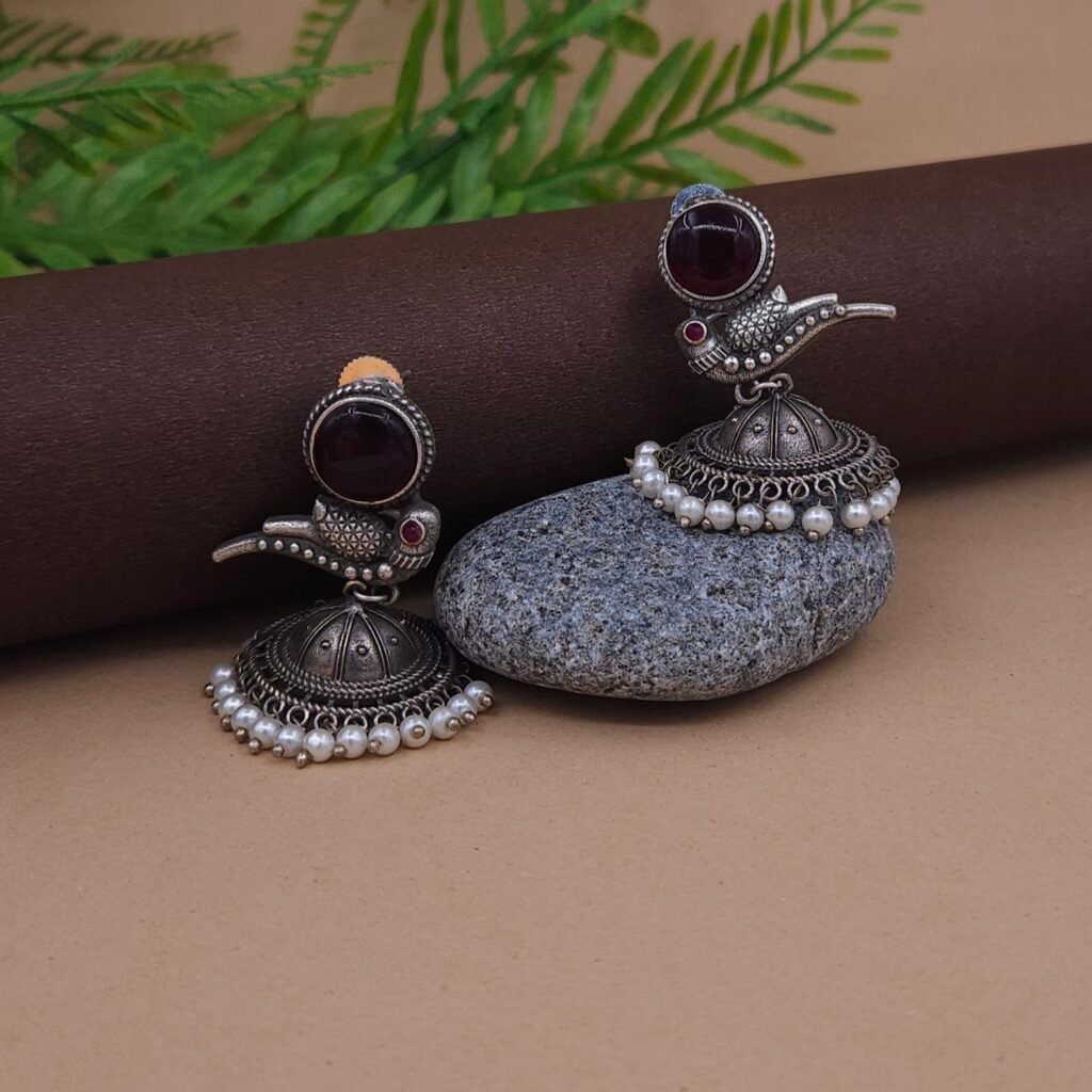 Antique Silver Plated Brass Bird Motif Jhumka Earrings with Red Monalisa Stone & Pearl Drops