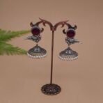 Antique Silver Plated Brass Bird Motif Jhumka Earrings with Red Monalisa Stone & Pearl Drops