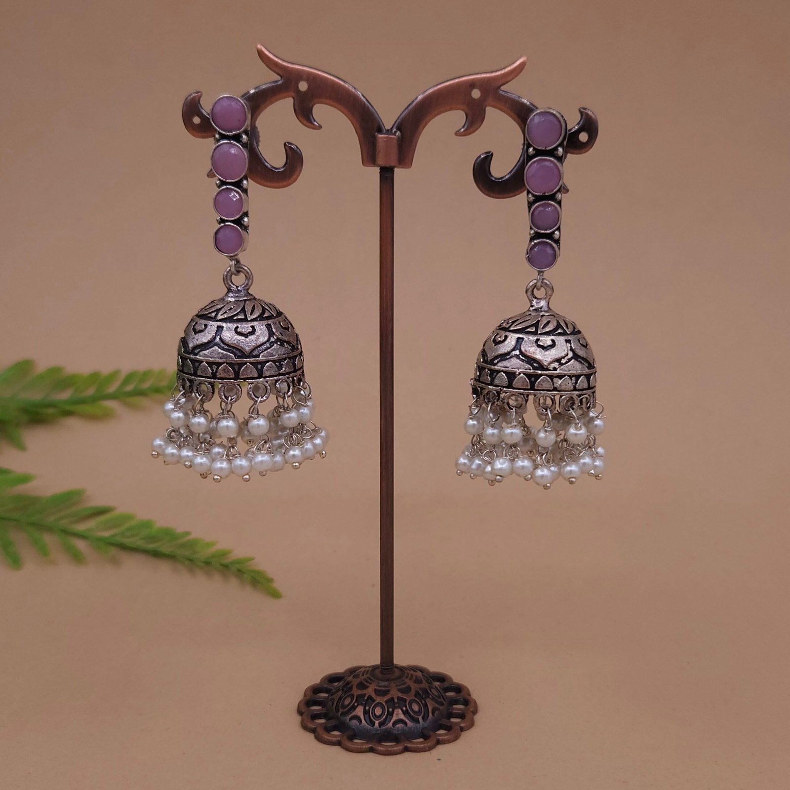 Antique Silver Brass Jhumka Earrings with Pearl Drop and Purple Accents Antique Silver Brass Jhumka Earrings with Pearl Drop and Purple Accents