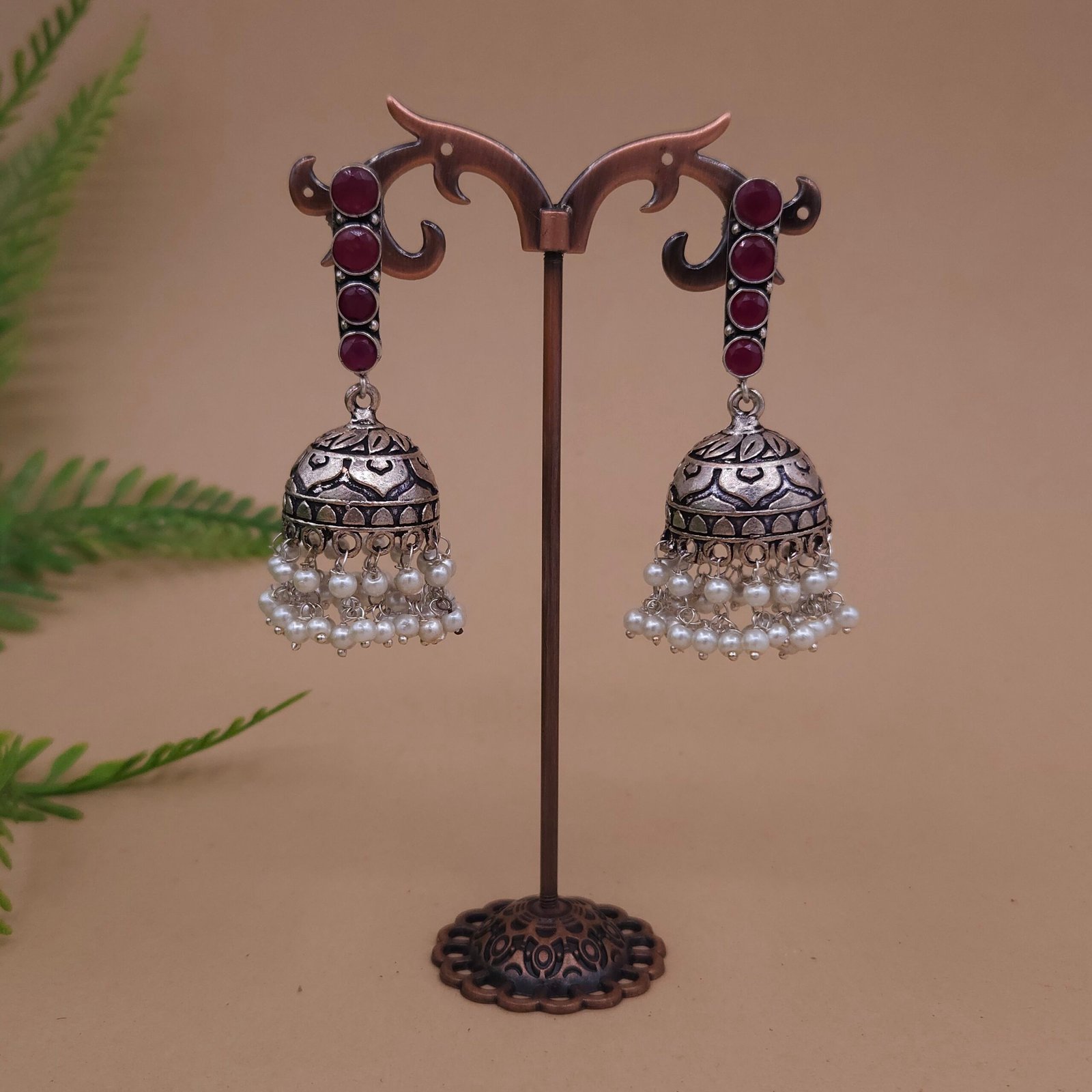 Handcrafted Antique Silver Brass Jhumka Earrings with Pearl Drops & Red Stones Handcrafted Antique Silver Brass Jhumka Earrings with Pearl Drops & Red Stones