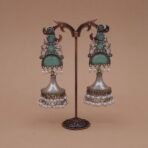 Handcrafted Antique Silver Brass Jhumka Earrings with Green Monalisa Stones & Pearl Drops