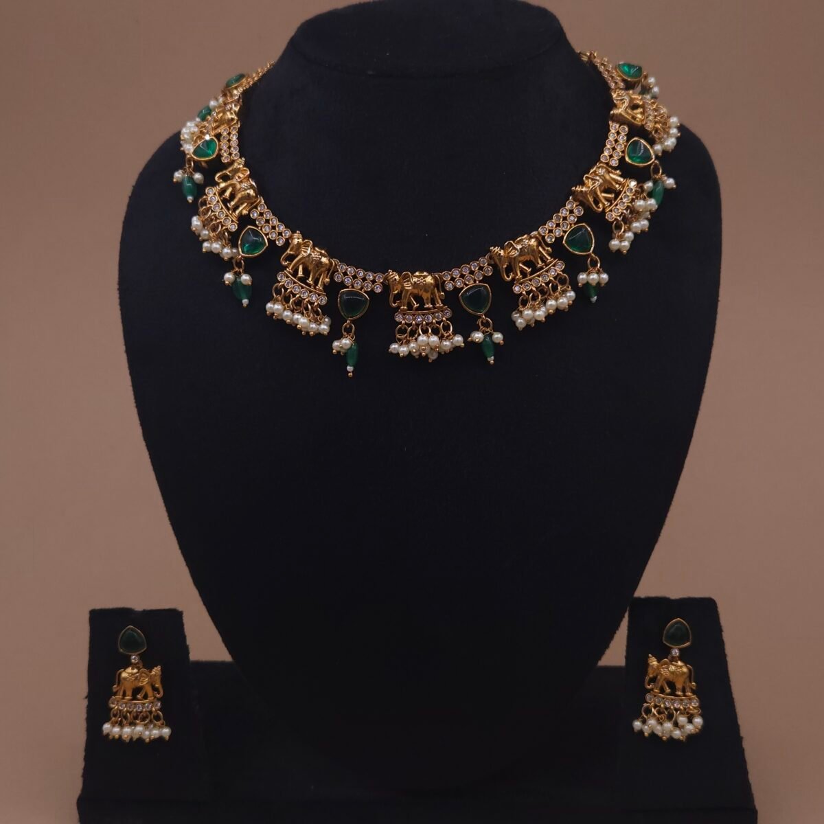 Khianaa anti-tarnish elephant necklace set side view with dangling pearl accents