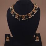 Khianaa anti-tarnish elephant necklace set side view with dangling pearl accents
